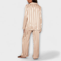 Beige casual set with long-sleeve button shirt and wide-leg striped trousers, back view