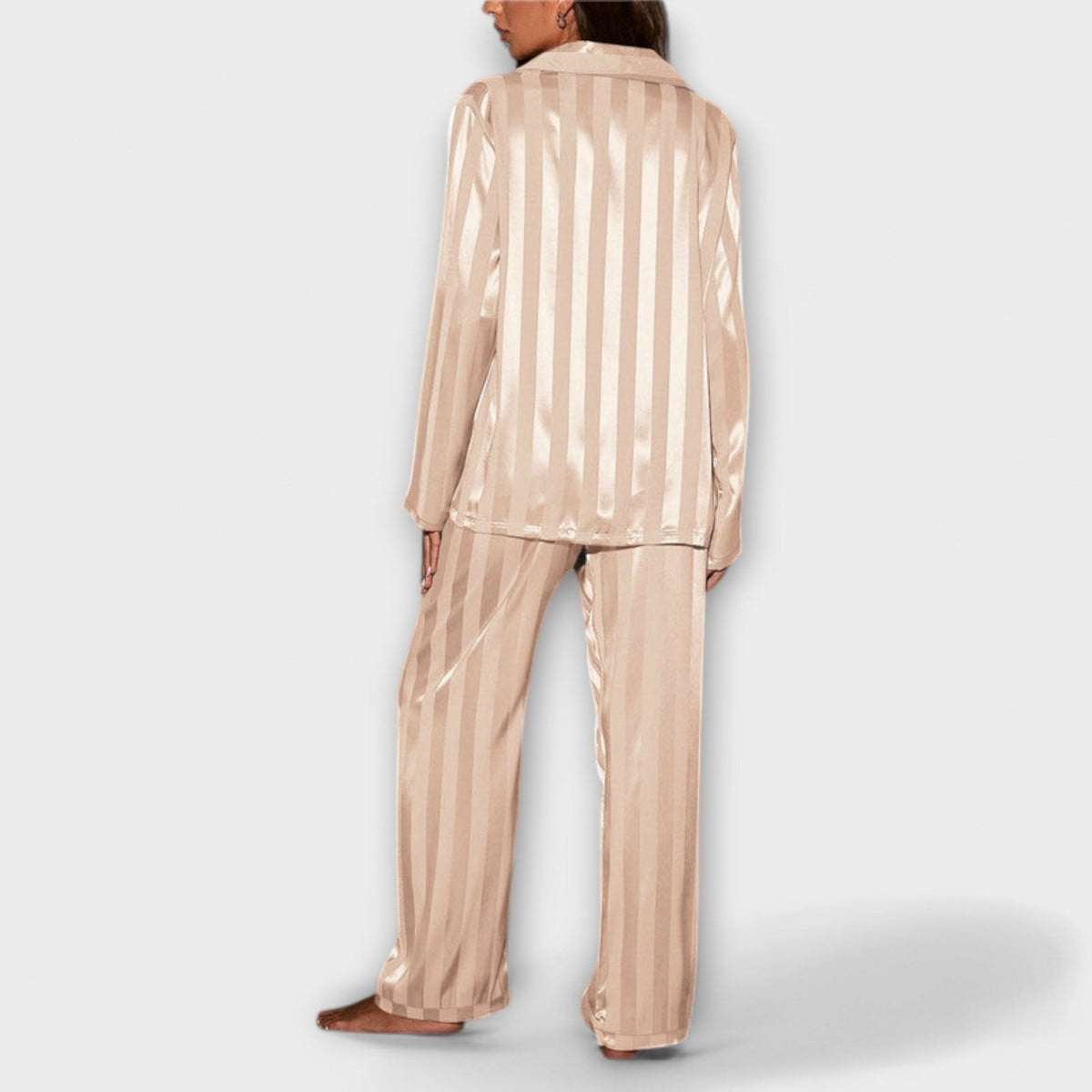 Beige casual set with long-sleeve button shirt and wide-leg striped trousers, back view