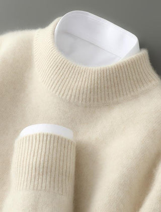 Cream soft knit mock neck jumper with ribbed cuffs and long sleeves.