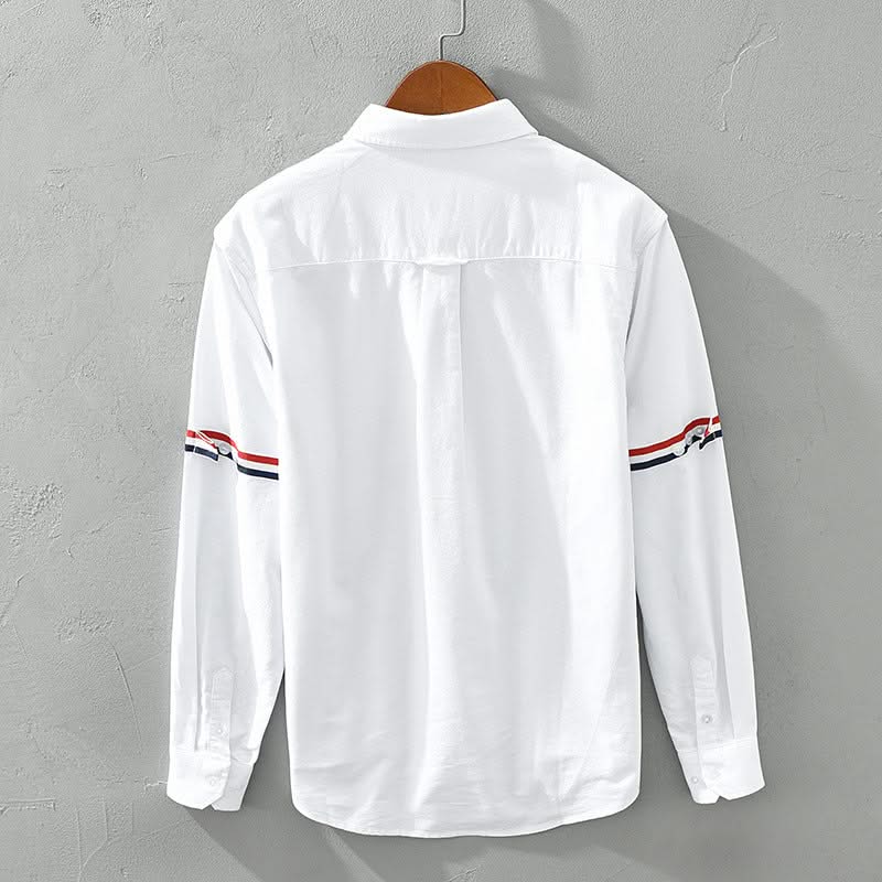 White linen shirt back view with button placket and striped sleeve cuffs