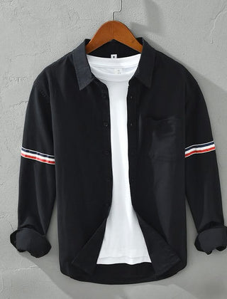 Black linen shirt with button front, chest pocket, and striped sleeve cuffs