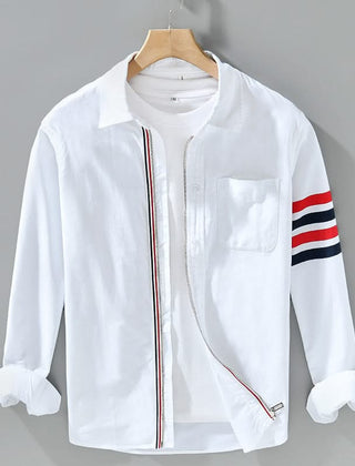 White cotton button-up shirt with chest pocket and red-striped sleeve detail