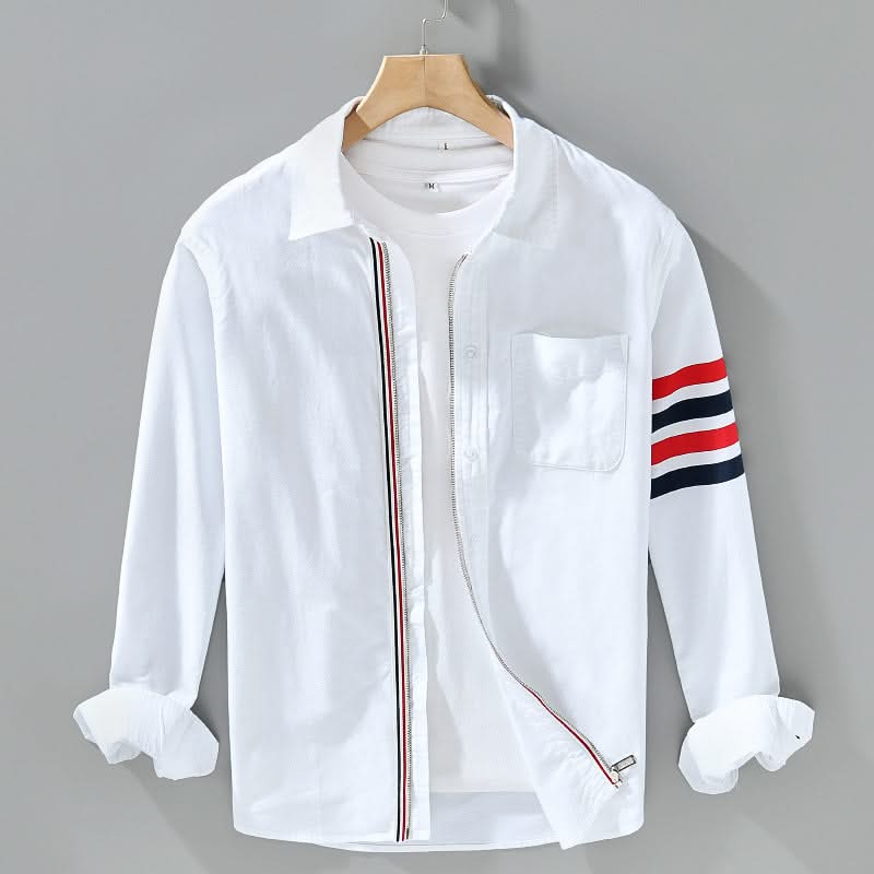 White cotton button-up shirt with chest pocket and red-striped sleeve detail