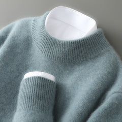 Light blue soft knit mock neck jumper with ribbed collar and sleeve cuffs.