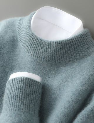 Light blue soft knit mock neck jumper with ribbed collar and sleeve cuffs.