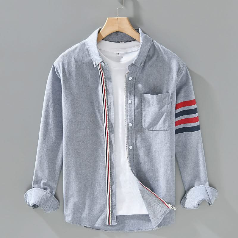Grey cotton button-up shirt with chest pocket and striped sleeve cuff