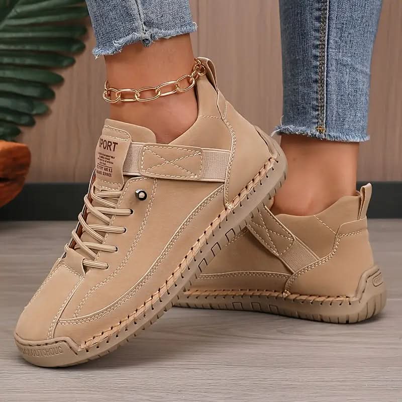 Beige orthopedic high-top sneakers with lace-up front and ankle side panel