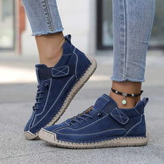Navy orthopedic high-top sneakers with lace-up closure and padded tongue