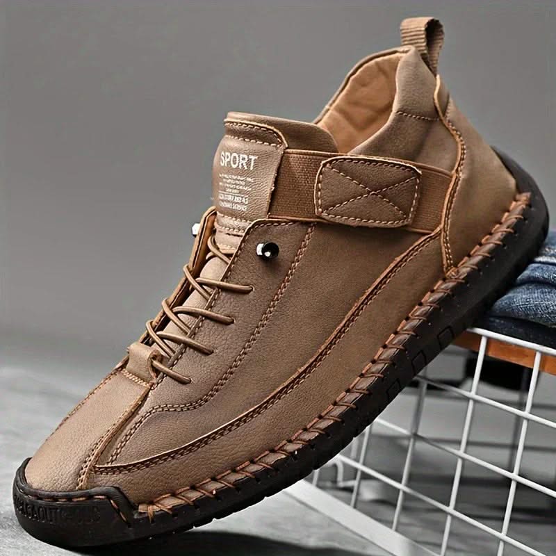 Tan orthopedic high-top sneakers with lace-up front and padded side support