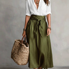 Two-piece set: white blouse and olive green midi skirt with tie waist