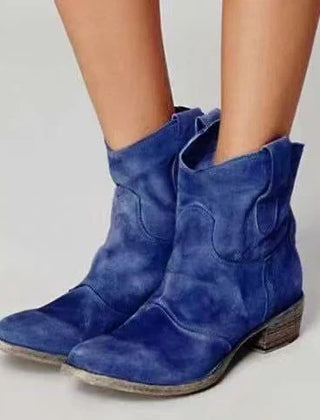 Dark blue suede orthopedic ankle boots with block heel and pull-on loop detail