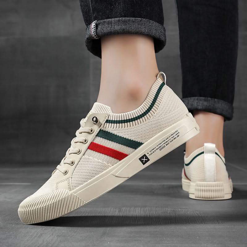 Sandstone knit sneakers, angled heel view with stripe panel and lace-up closure