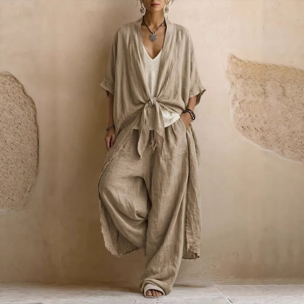Apricot oversized linen kimono set with tied front and wide-leg pants, flowing silhouette.