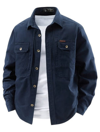 Navy utility shirt with button front, two chest flap pockets, long sleeves.