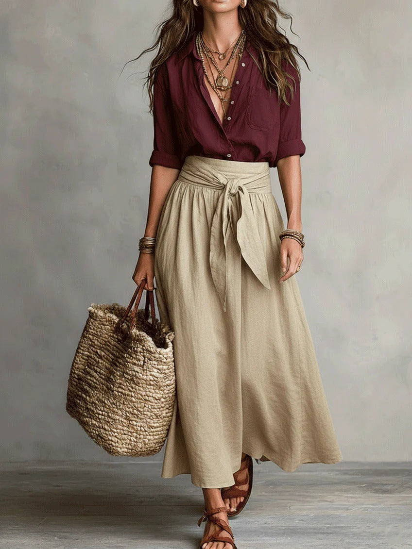 Two-piece set: maroon blouse and beige midi skirt with tie waist