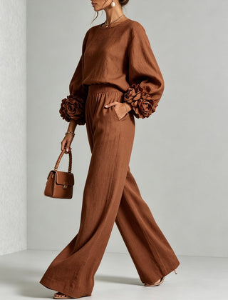 Rust brown two-piece set: long-sleeve blouse and wide-leg pants with floral puff cuff sleeves