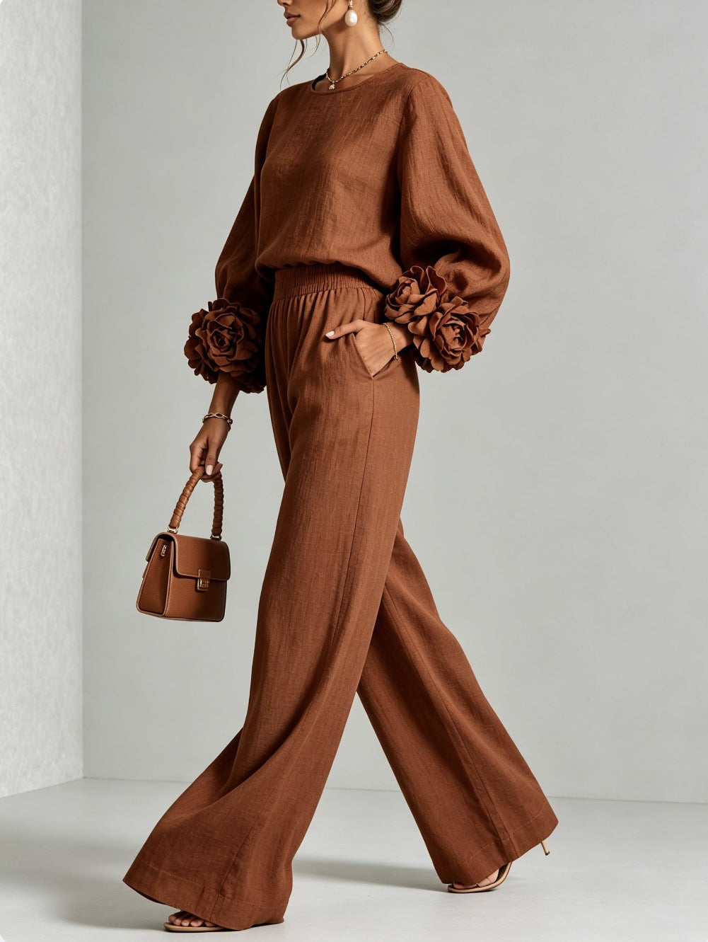 Rust brown two-piece set: long-sleeve blouse and wide-leg pants with floral puff cuff sleeves