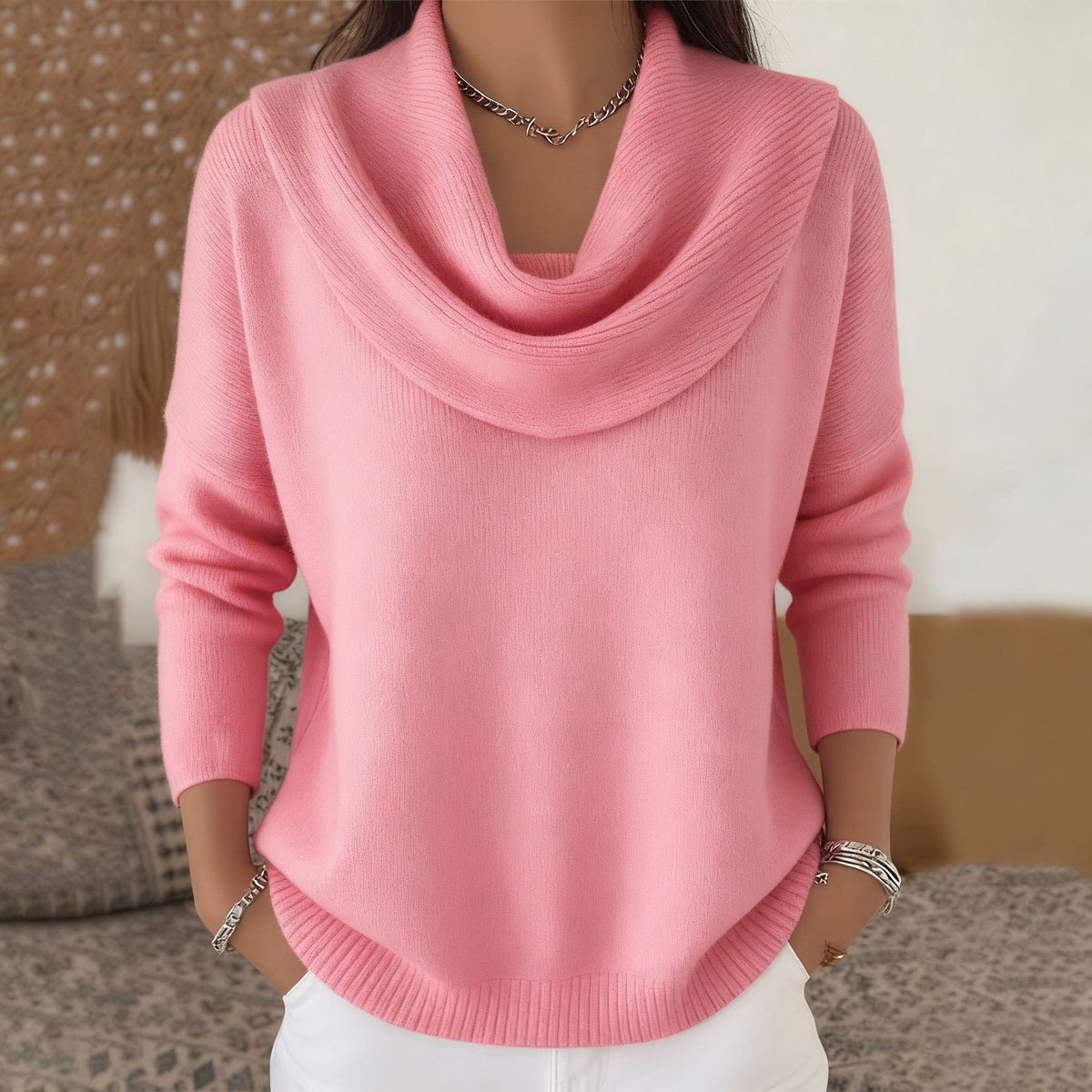 Pink cowl neck knit jumper with draped cowl neckline and ribbed cuffs and hem