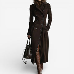 Dark brown long trench coat with double-breasted buttons, notched lapels, belt, side slit.