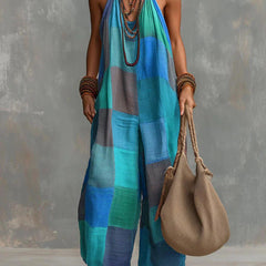 Blue patchwork sleeveless wide-leg jumpsuit with halter neckline