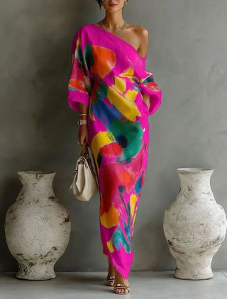 One-shoulder maxi dress in magenta with multicolor abstract paint pattern, draped sleeves