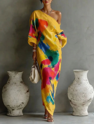 One-shoulder maxi dress in yellow with multicolor abstract paint pattern, draped sleeves