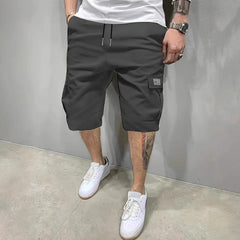 Dark charcoal utility shorts with drawstring waist and side cargo pockets