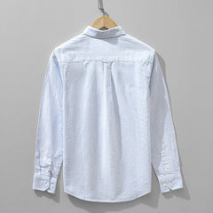 Men's blue striped linen shirt, back view with buttoned collar and long sleeves