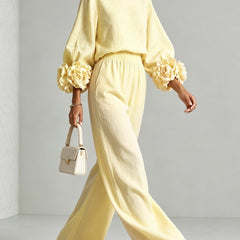 Light yellow floral-cuff two-piece set with long-sleeve top and wide-leg pants