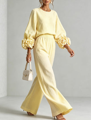 Light yellow floral-cuff two-piece set with long-sleeve top and wide-leg pants