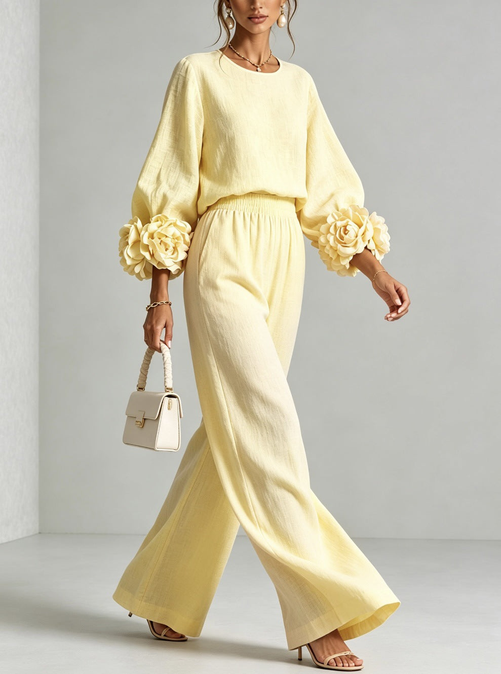 Light yellow floral-cuff two-piece set with long-sleeve top and wide-leg pants