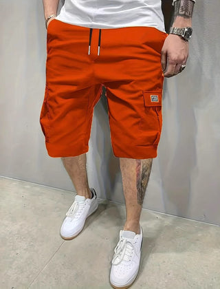 Orange utility shorts with drawstring waist and side cargo pockets