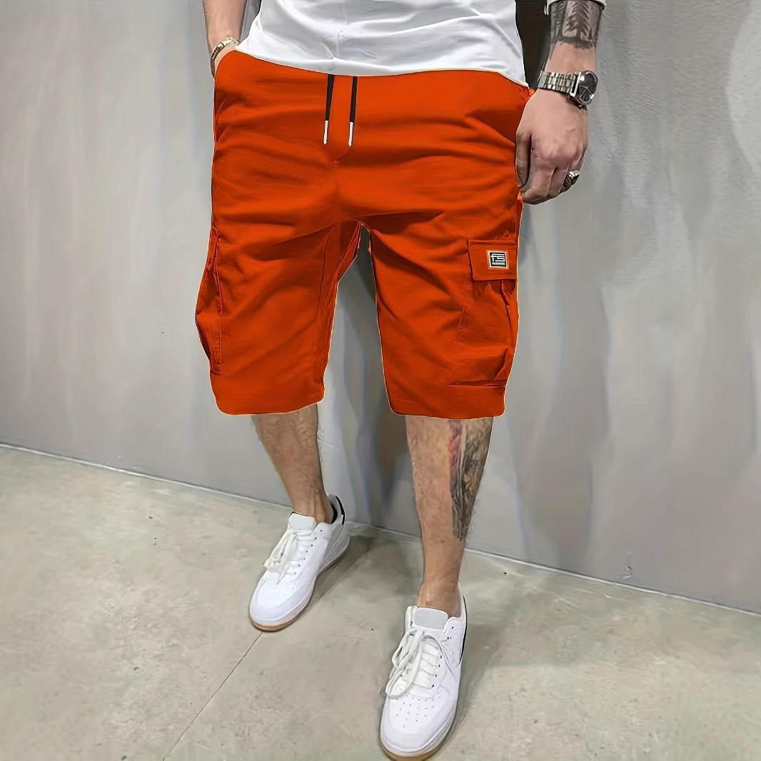 Orange utility shorts with drawstring waist and side cargo pockets