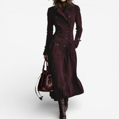 Maroon long trench coat with double-breasted buttons, notched lapels, belt, flap pockets.
