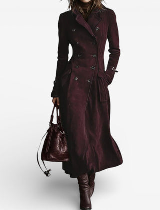 Maroon long trench coat with double-breasted buttons, notched lapels, belt, flap pockets.