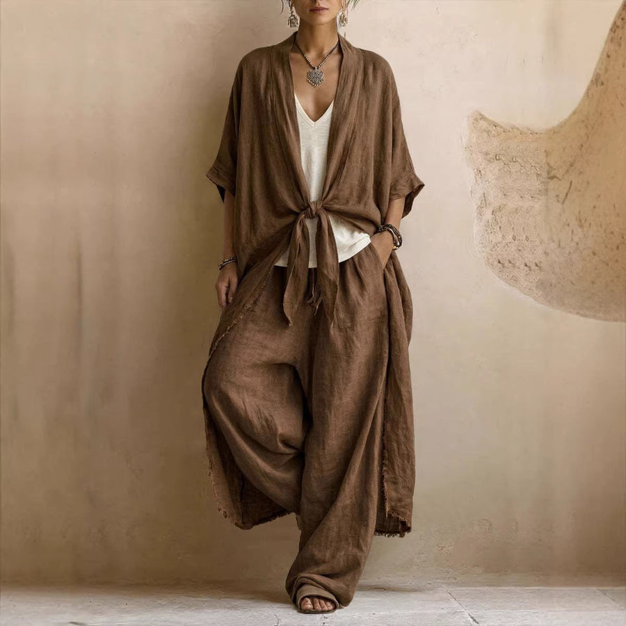 Brown oversized linen kimono set with knotted front and wide-leg pants, loose drape.