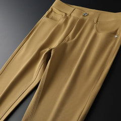 Khaki premium pants waist and front button detail with belt loops