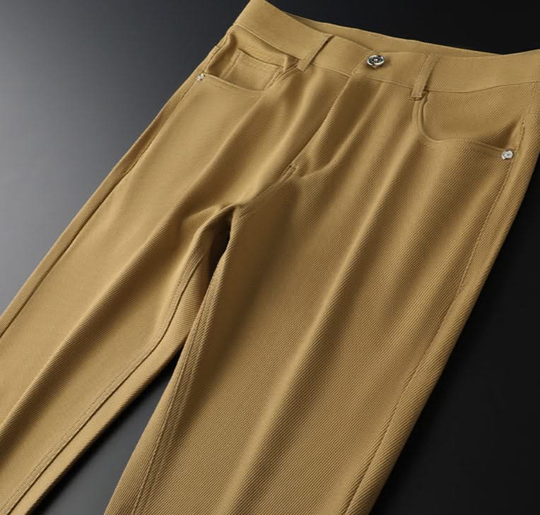Khaki premium pants waist and front button detail with belt loops