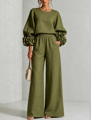Green two-piece set: long-sleeve blouse and wide-leg pants with floral puff cuff sleeves