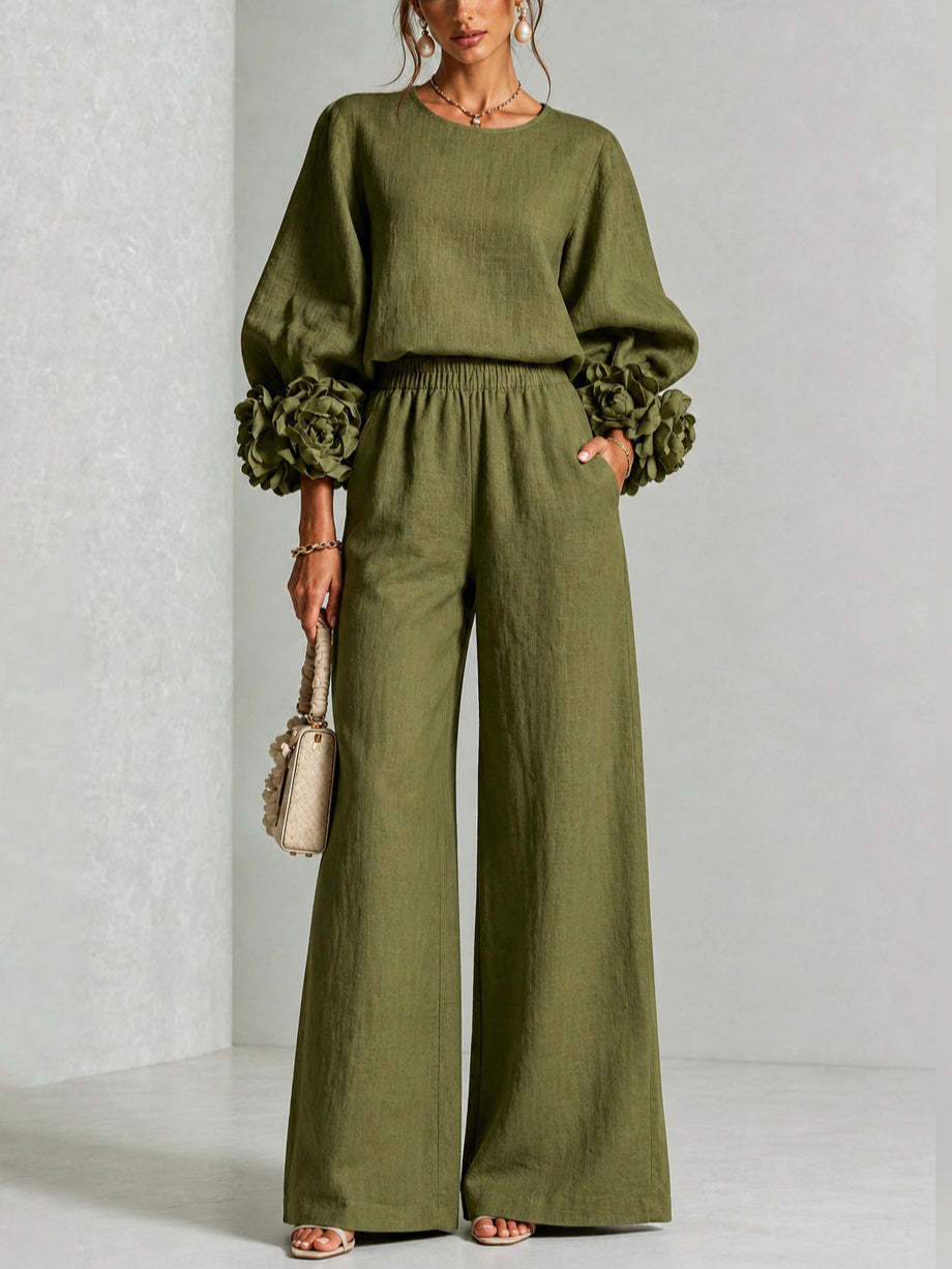 Green two-piece set: long-sleeve blouse and wide-leg pants with floral puff cuff sleeves