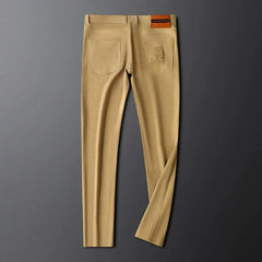 Khaki premium pants front view on hanger with side pockets and logo on right
