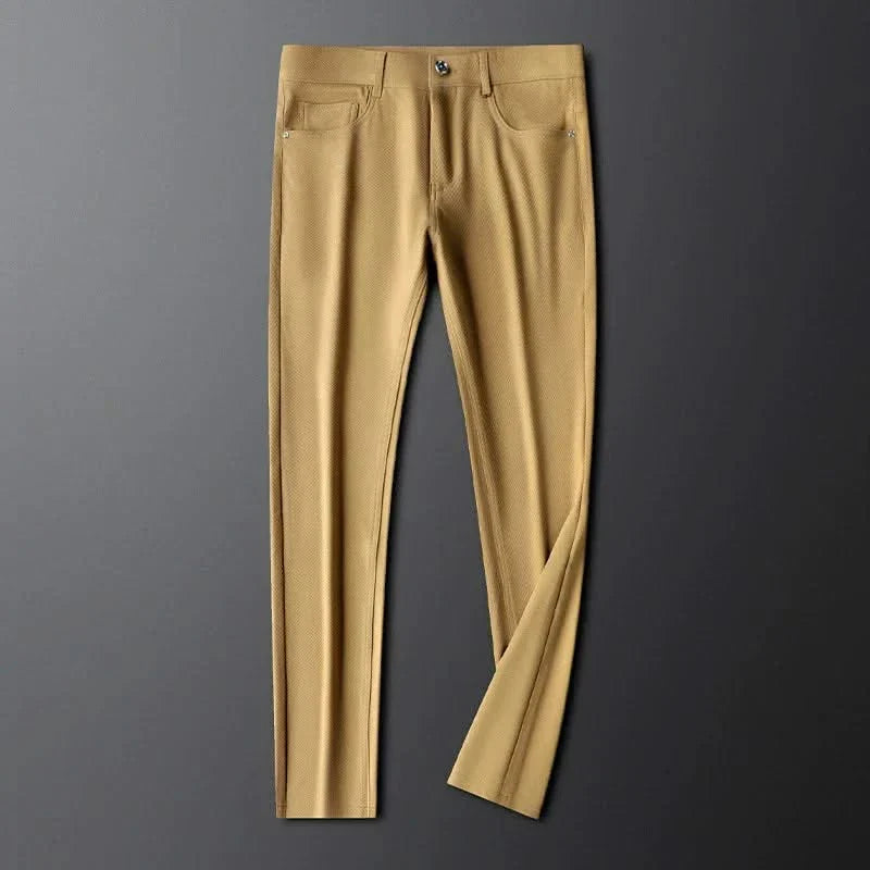 Tan premium pants with stitched detailing and two front slash pockets