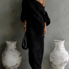 Black one-shoulder maxi dress with draped wrap bodice and long column skirt
