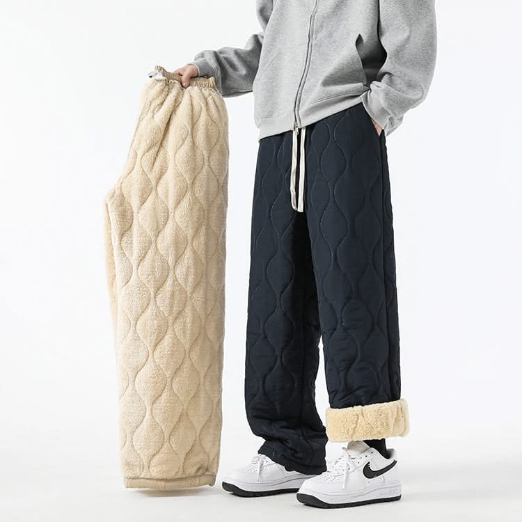 Dark quilted drawstring pants with elastic waist and sherpa-lined cuffs.