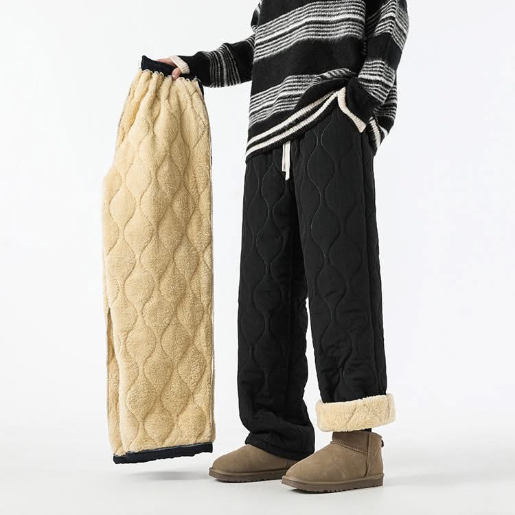 Black quilted drawstring pants with elastic waist and sherpa-lined cuffs.