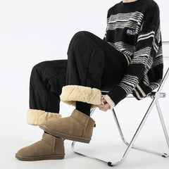Black quilted jogger pants with sherpa-fleece cuff hems and drawstring waist