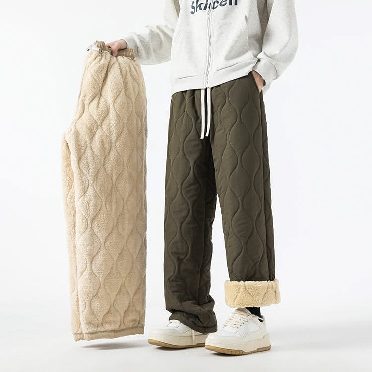 Olive quilted pants with elastic waist, drawstring, and sherpa-lined cuffs.