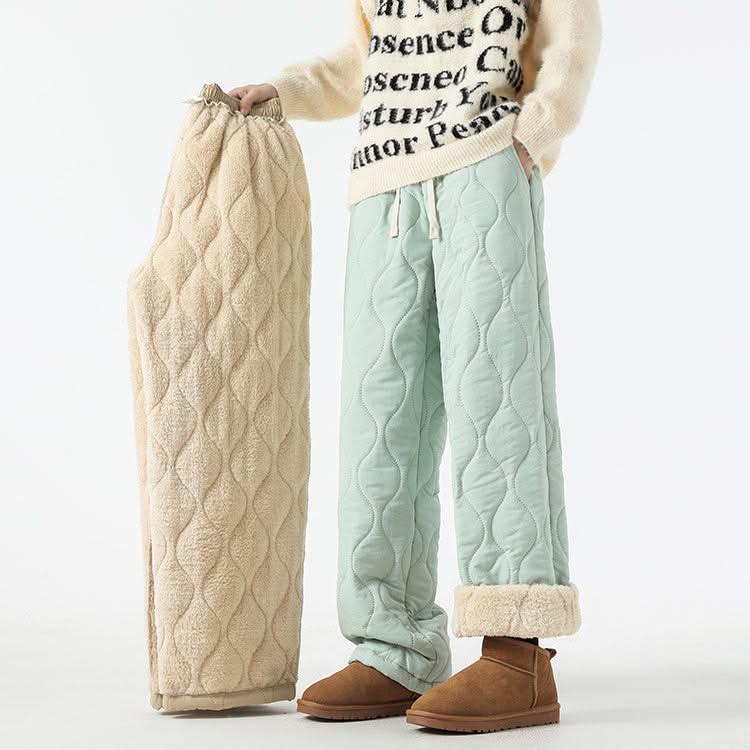 Mint-green quilted drawstring pants with elastic waist and sherpa-lined cuffs.