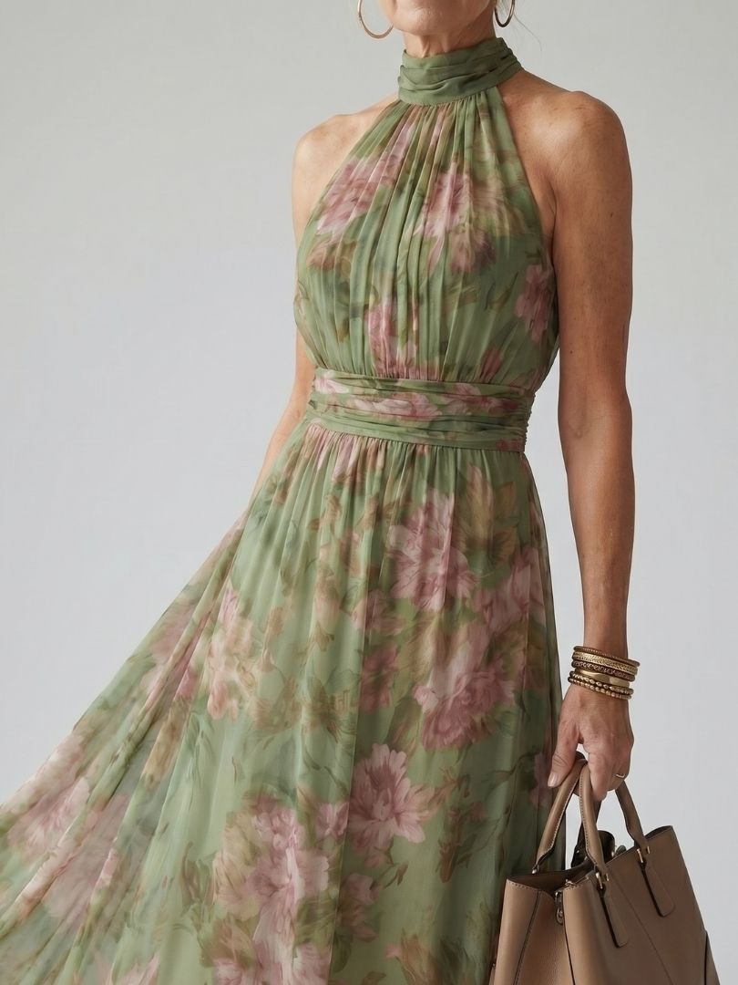 Floral halter midi dress, green with pink blooms; gathered waist, sleeveless.