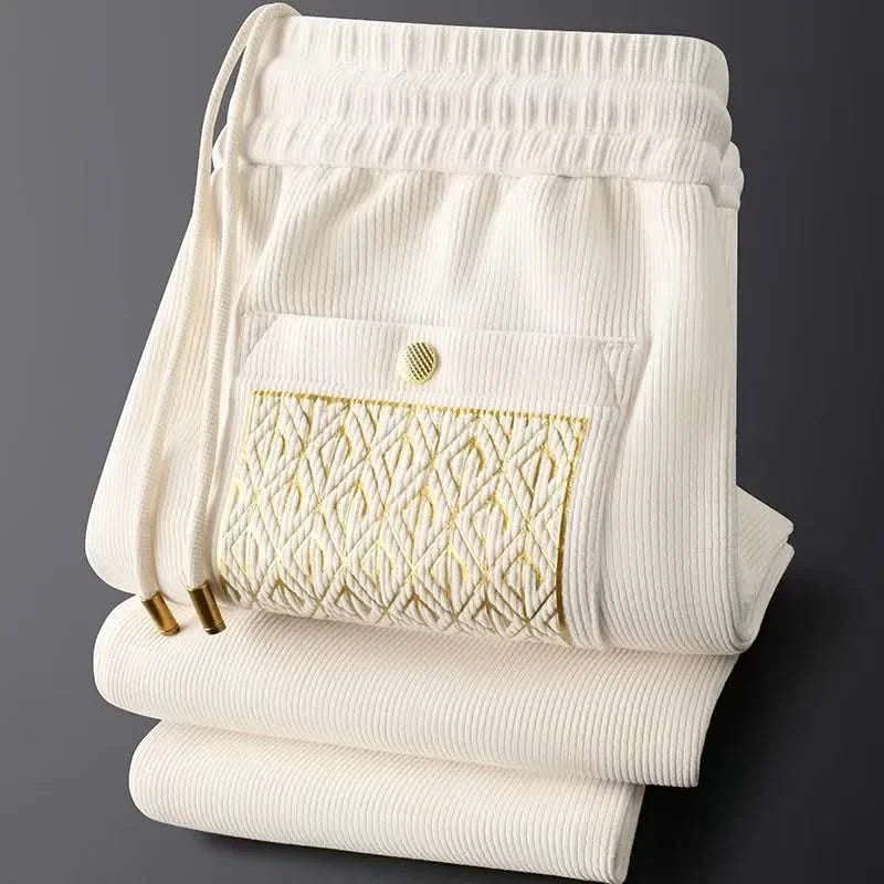 White ribbed cotton pants, elastic waist with drawstring, front pocket
